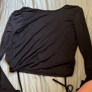 XS black long sleeve shirt with an open back